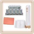 Clapio Cell Plus device with packaging and accessories on a beige background
